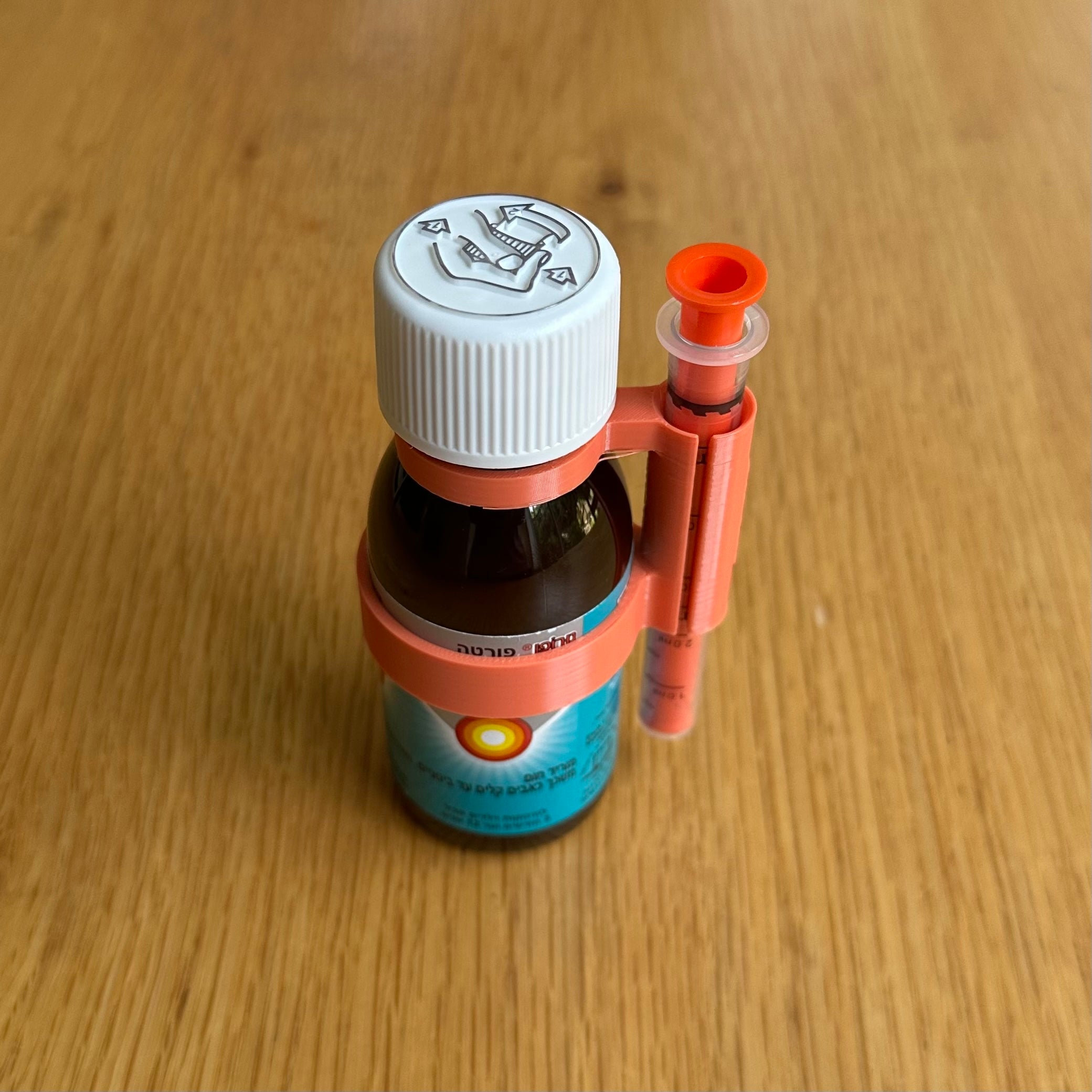 מחזיק למזרק נורופן פורטה לילדים 100 מ״ל